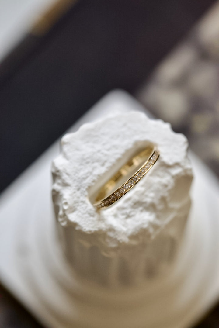 CHANNEL SETTING RING WITH ZIRCONS