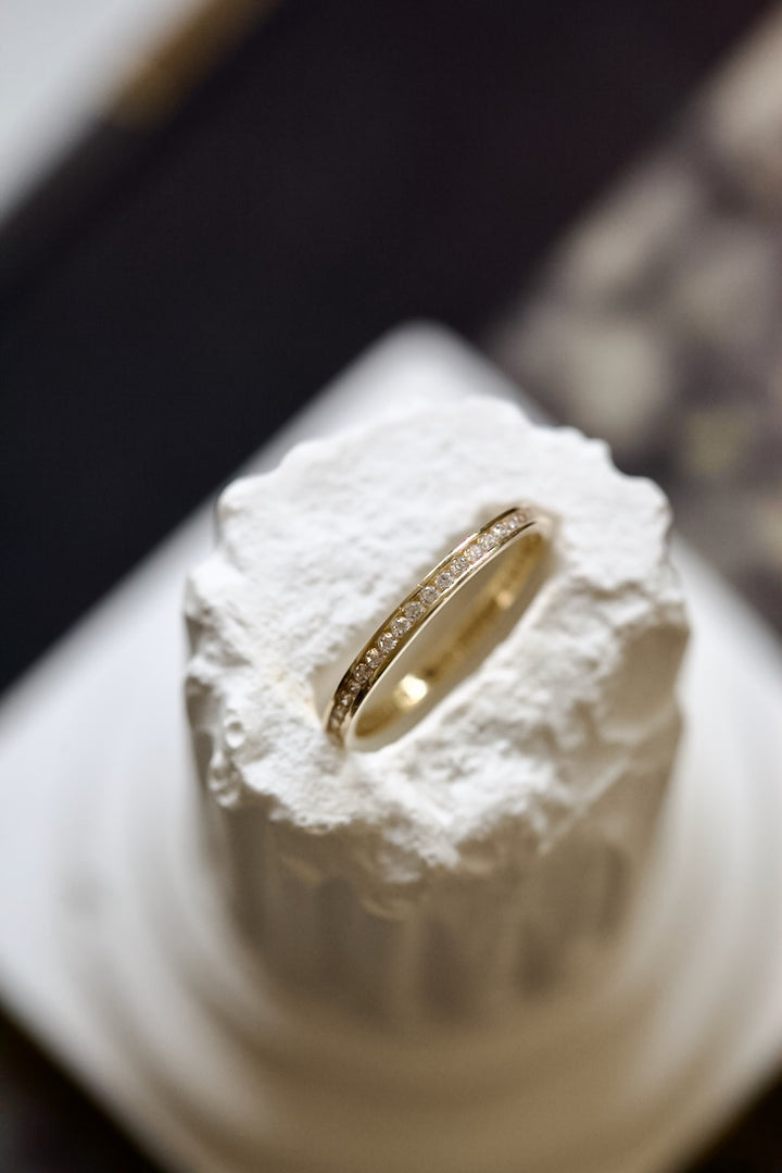 CHANNEL SETTING RING WITH ZIRCONS