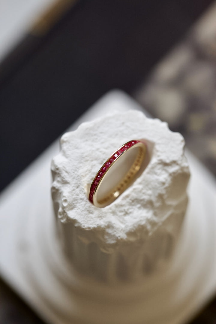CHANNEL SETTING RING WITH MAGENTA ZIRCONS