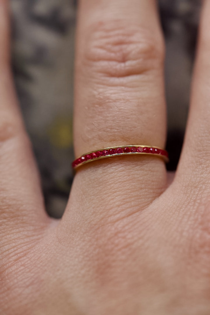 CHANNEL SETTING RING WITH MAGENTA ZIRCONS