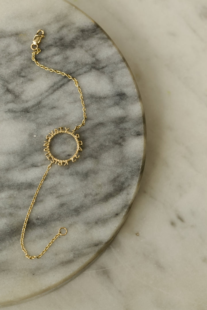 CHAPTER 1 TEXT BRACELET IN GOLD