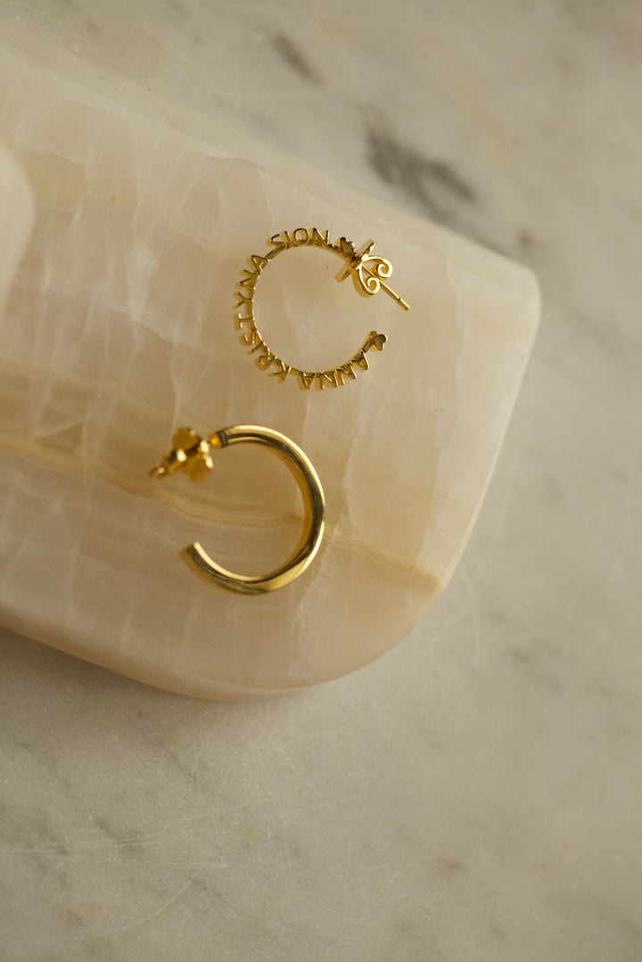 CHAPTER 1 TEXT HOOP EARRINGS - IN SILVER