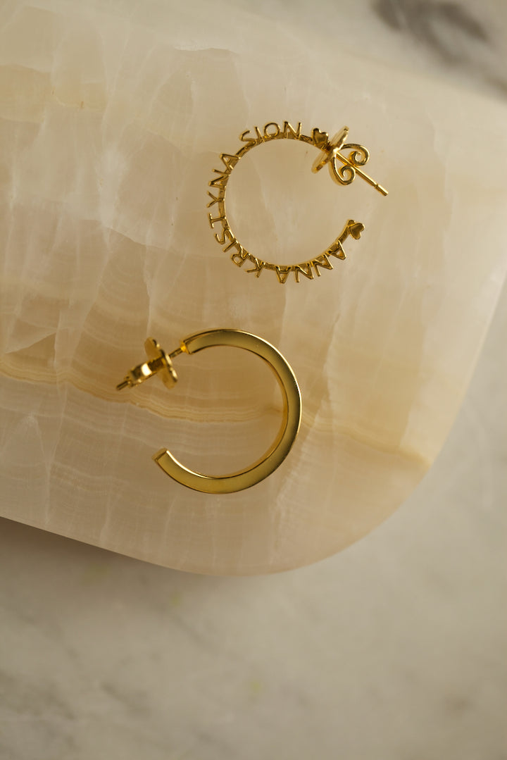 CHAPTER 1 TEXT HOOP EARRINGS - IN SILVER