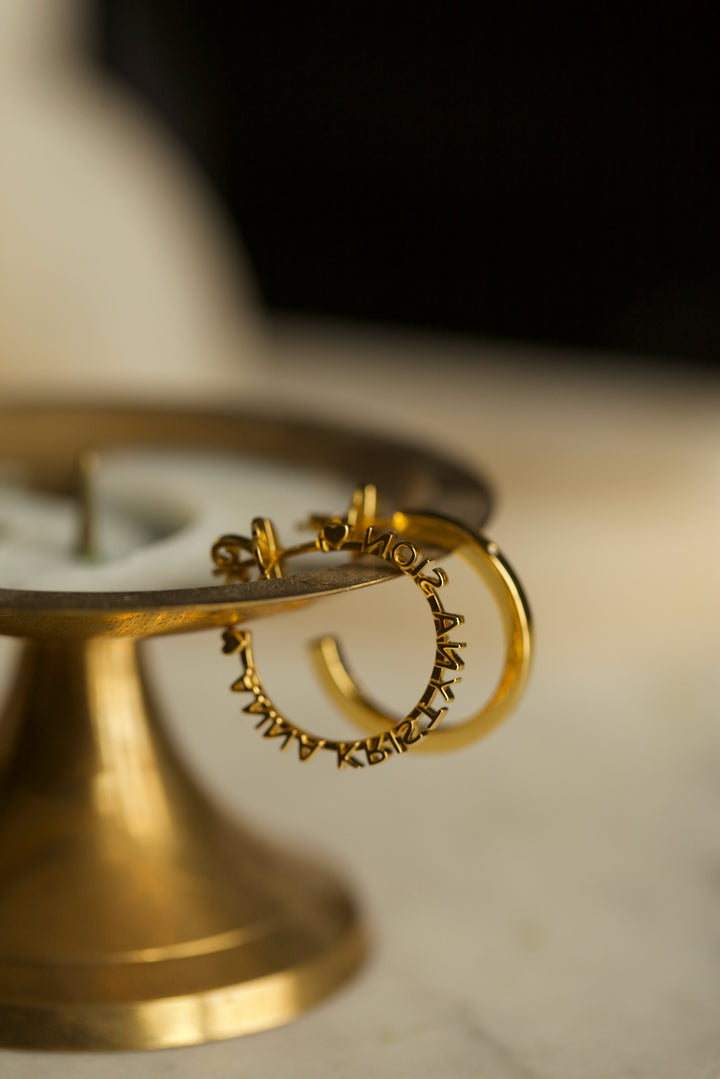 CHAPTER 1 TEXT HOOP EARRINGS - IN SILVER