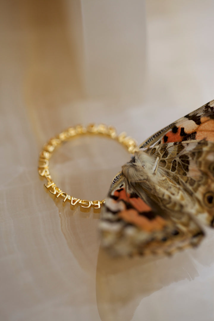 CHAPTER 1 TEXT RING - YELLOW GOLD PLATED SILVER