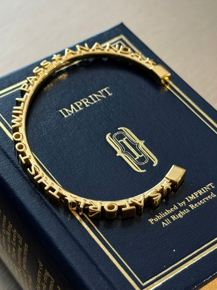 CHAPTER 11 TEXT BANGLE - IN GOLD
