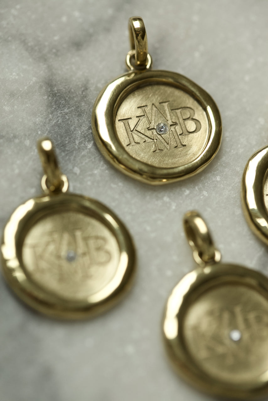 "SISTERHOOD" PENDANT